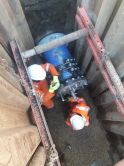 Slip lining HDPE pipeline through cast iron main - DrainsAid