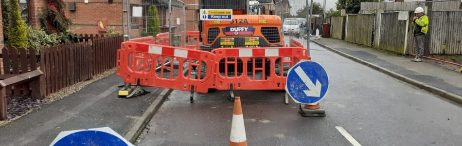 sewer connection site with traffic management